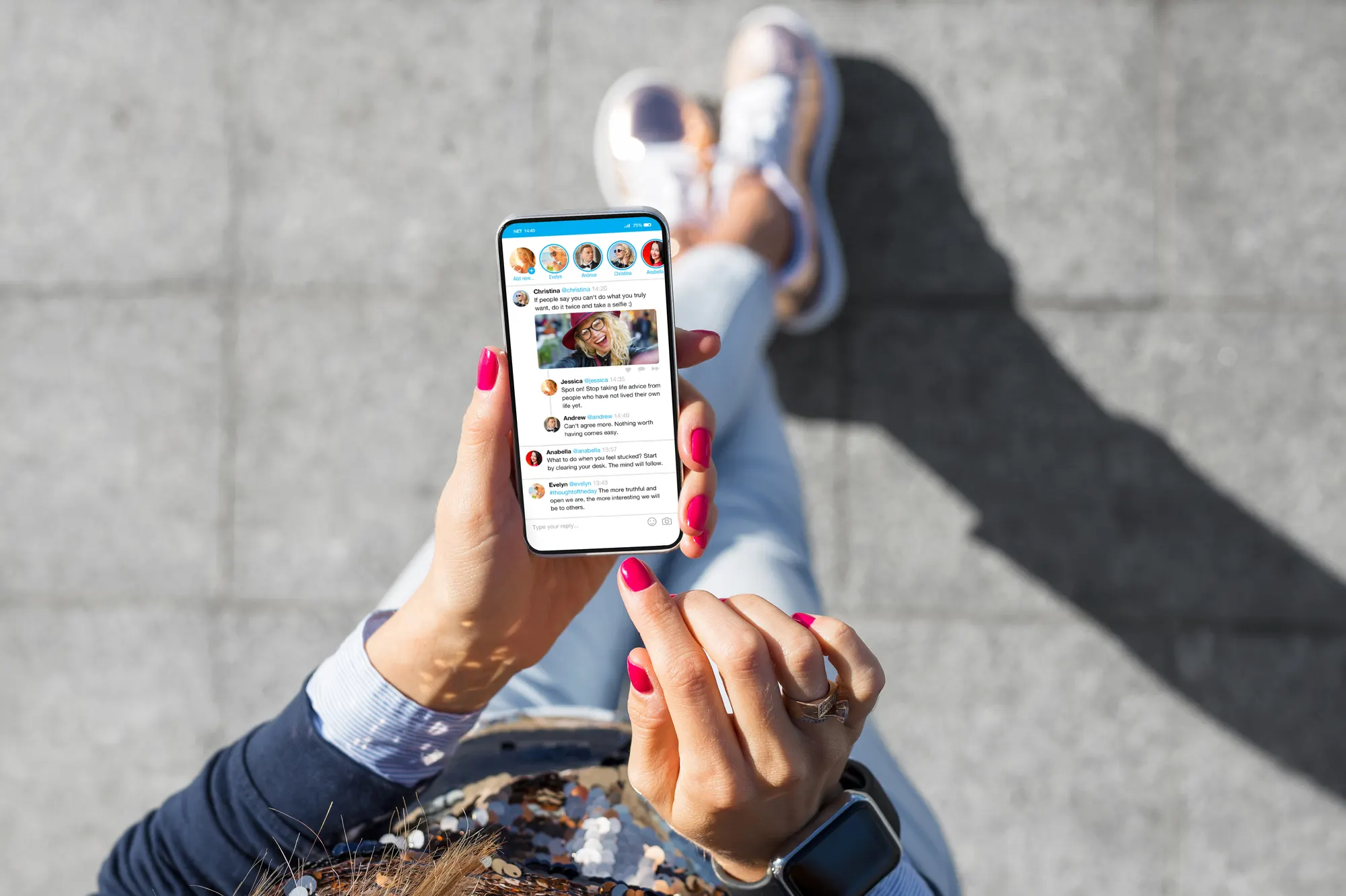 A person holding a smartphone and scrolling through a social media app